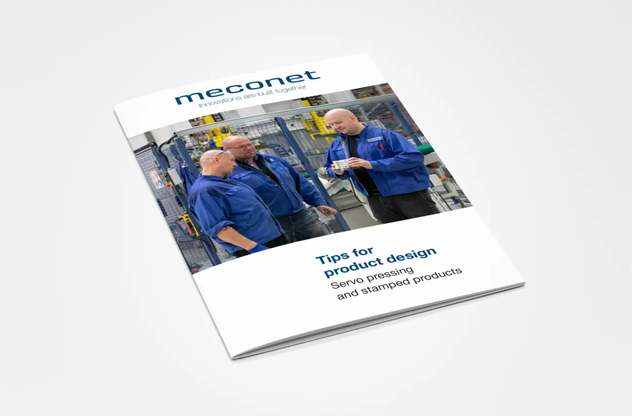 Cover of the guide to servo pressing and stamped products: three people examining a metal component on the factory floor.
